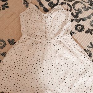 Black and white polka dot romper